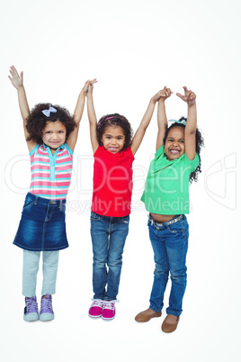 Three small girls standing together