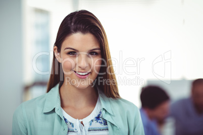 Young creative worker using tablet