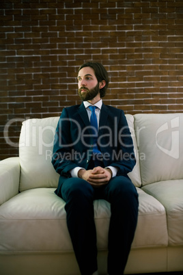 Businessman sitting on the couch