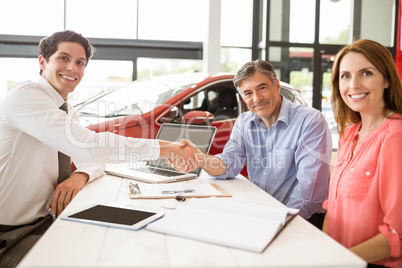 Customers signing some important documents