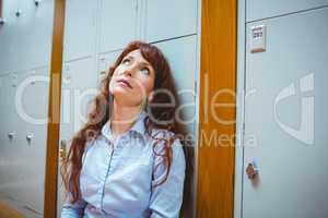 Mature student feeling stressed in hallway