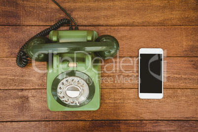 View of an old phone and a smartphone