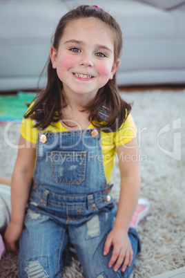 Smiling kid kneeling down