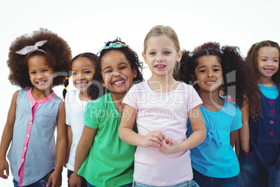 Smiling girls all standing together