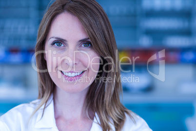 Scientist looking at camera in the laboratory