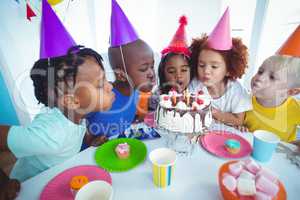 Excited kids enjoying a birthday party