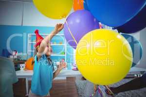 Happy kids with balloons