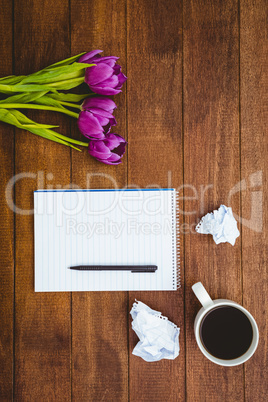 Purple flowers and a cup of coffee