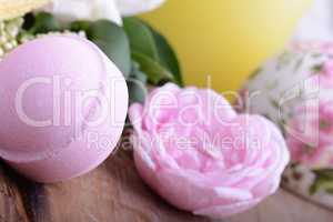 Spa theme with candles and flowers on wooden background