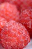 Fresh sweet raspberries close up.