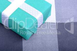 holiday Green gift box with white ribbon