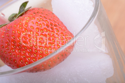 strawberry frozen in ice cube, health food concept