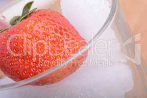 strawberry frozen in ice cube, health food concept