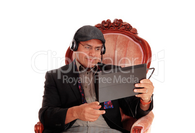 Man listening from his tablet.