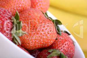 strawberries and bananas close up, health food concept