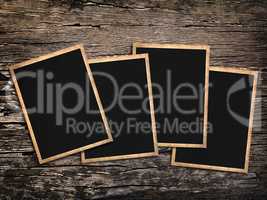 old vintage  photos on a wooden background