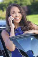 Asian Woman or Businesswoman Talking on Cell Phone