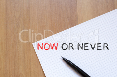 Now or never write on notebook