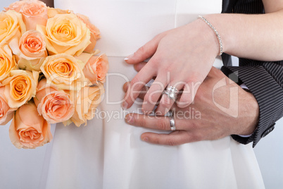 Hands of a newlywed couple