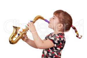 little girl play saxophone