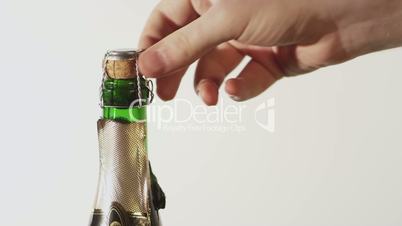 Opening a bottle of champagne