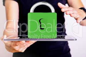 Hand holding tablet pc with padlock