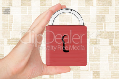 Hand holding padlock