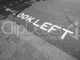 Black and white Look Left sign
