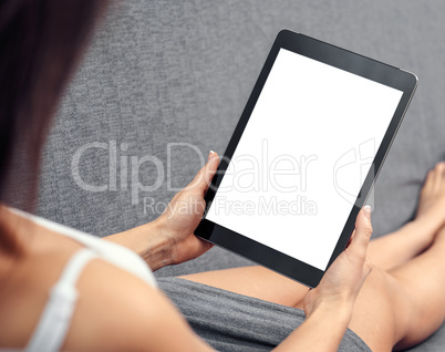 Woman using tablet computer