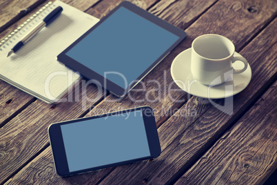 Smartphone and tablet on table