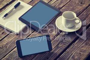 Smartphone and tablet on table