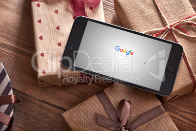Iphone 6 plus among gift-boxes