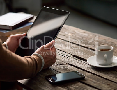 Man using tablet device