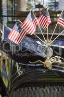 American Flags On Hood Ornament of Classic Car
