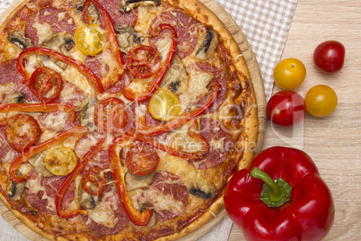 Pizza with peppers and tomatoes