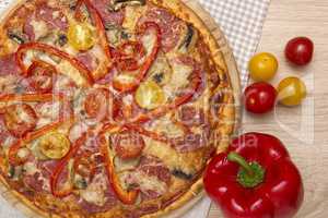 Pizza with peppers and tomatoes