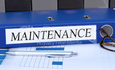 Maintenance - blue binder in the office