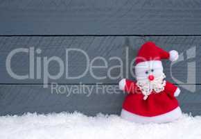 Merry Christmas - Santa Claus on wooden background