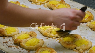 german bakery spread liquid sugar on blancmange cookie 11682