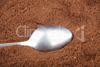 milled coffee  and teaspoon