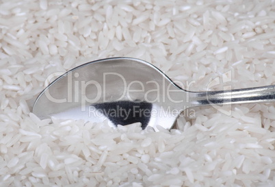 rice background and teaspoon