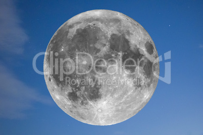 Full moon over blue sky