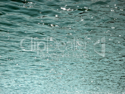 glare on water in city park pond