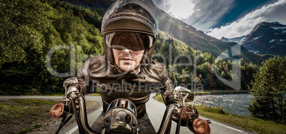 Biker racing on the road