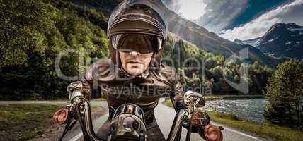 Biker racing on the road