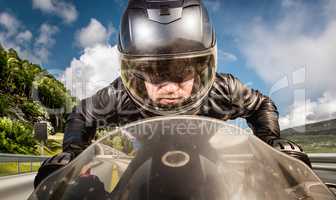 Biker racing on the road