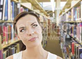 Mixed Race Girl Looking to the Side in the Library