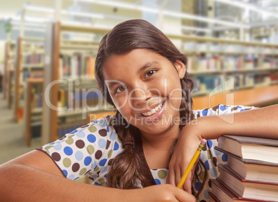 Hispanic Girl Student Studying in Library