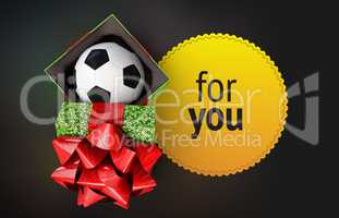 shiny gift box soccer bal ribbon yellow badge dark background isolated render