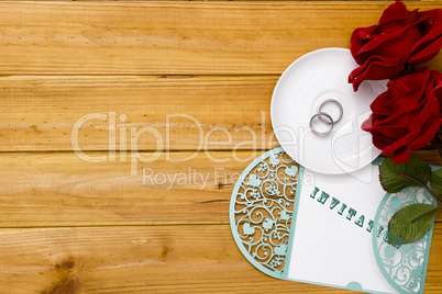 Invitation to the wedding with wedding rings